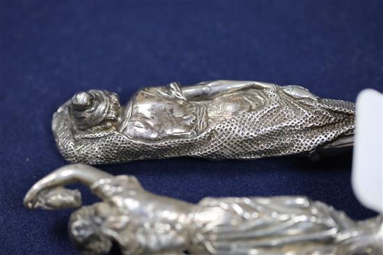 A pair of Victorian silver fish servers, with cast figural handles modelled as a fisherman and his wife, Francis Higgins III,